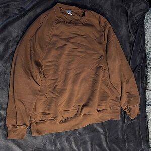 Brown oversized sweater.